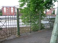 The gate in the iron fence at the Northernhay Walk The gate in the iron fence at the Northernhay Walk