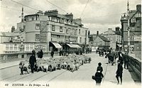 Sheep being driven over Exe Bridge.