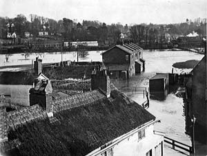 View of a flooded Exwick leat. View of a flooded Exwick leat.