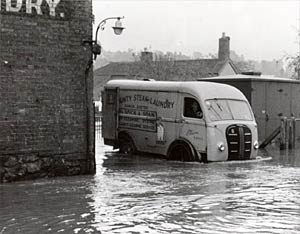 A County Steam Laundry van in a flood A County Steam Laundry van in a flood