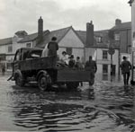 A truck rescues people A truck rescues people