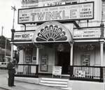 The bombs drop and fires rage over Exeter The billboards for Twinkle