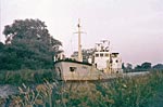 Matilda tank in the desert. SW2 moored up by the sewage works.