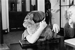 Cuddling a stuffed rabbit Cuddling a stuffed rabbit