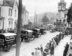 Colsons vans in a parade Colsons vans in a parade